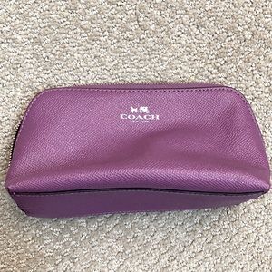 Lavender color Coach make-up bag